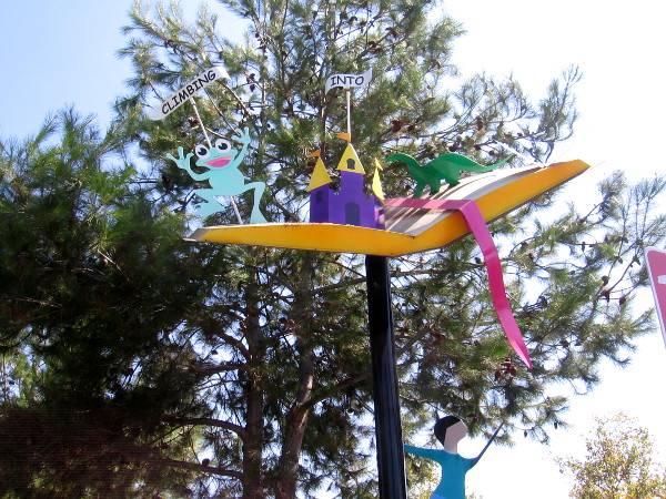 Up in the sky are many colorful wonders toward with the children together climb.