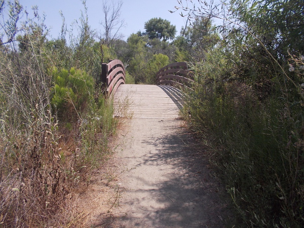 Approaching a footbridge that spans the San Diego River.