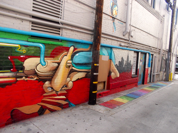 Continuation of the Maxx Moses mural around the corner.