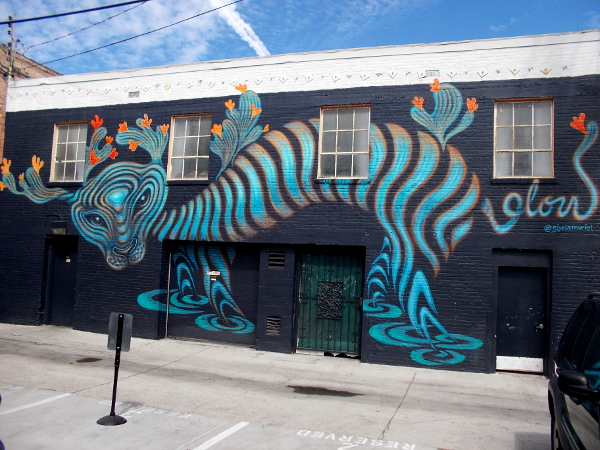 Gloria Muriel mural in a Hillcrest alley.