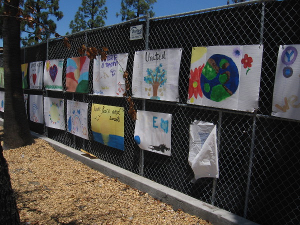 Artwork along the fence represents the optimism of La Mesa residents.
