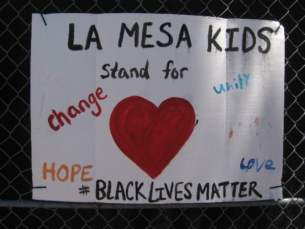 La Mesa kids stand for change, unity, hope, love.