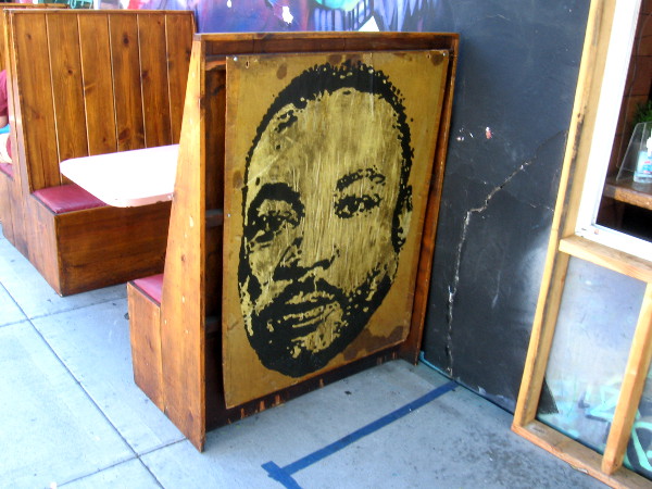 Face painted on temporary outdoor seating at Pokez Restaurant.