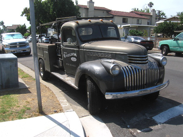 Check out this cool old truck. A guy with the welding company talked to me near a sculpture of a bison in his lot near the sidewalk, but I didn't think to snap a photo of it before I had resumed walking. Bummer.r.