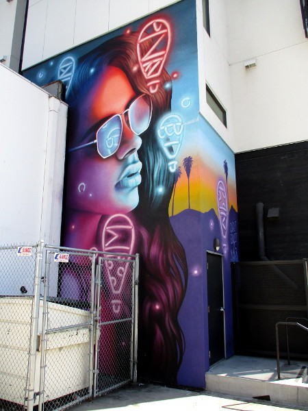 Cool face of East Village mural by Carly Ealey and Christopher Konecki of Cohort Collective.