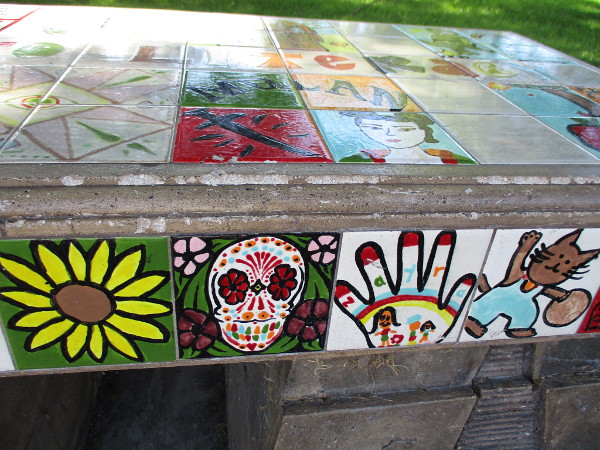 More colorful, imaginative tiles painted by youth.