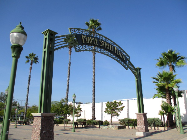 Landmark sign arches above the south end of Maple Street Plaza in Escondido.