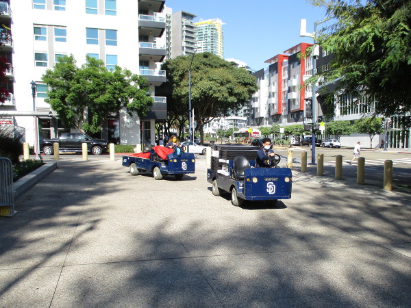 Padres employees round a corner of Petco Park getting everything ready for the start of the MLB postseason.