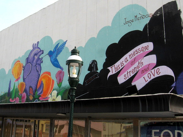 Inspiring mural painted by Jorge Mendoza in Chula Vista. This is a message of strength and love.