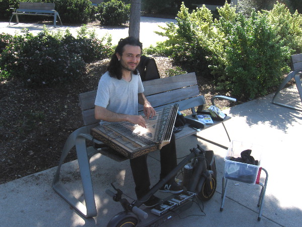 Whenever I hear this friendly street musician playing beautiful music, I pause for a bit to listen.