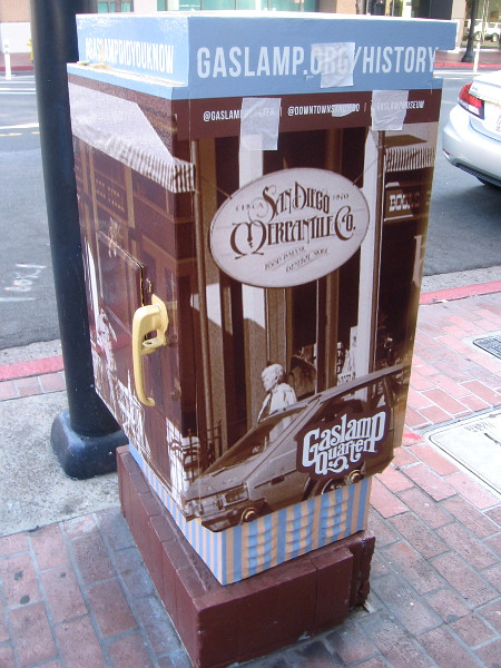 Artwork on a Gaslamp Quarter utility box shows historical photo of the San Diego Mercantile Co.