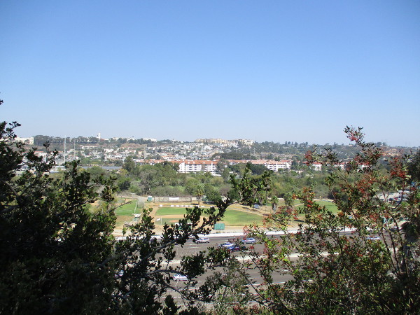 Looking north into Mission Valley. Beyond lanes of Interstate 8, I see a baseball diamond used by the Presidio Little League.