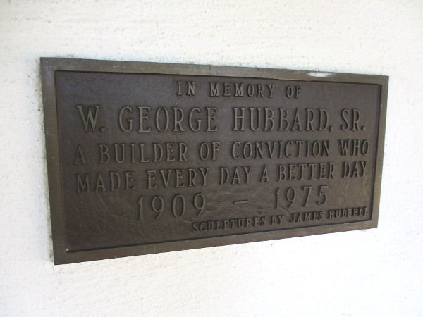 Plaque near the portico sculptures: In memory of W. George Hubbard, Sr. A builder of conviction who made every day a better day.