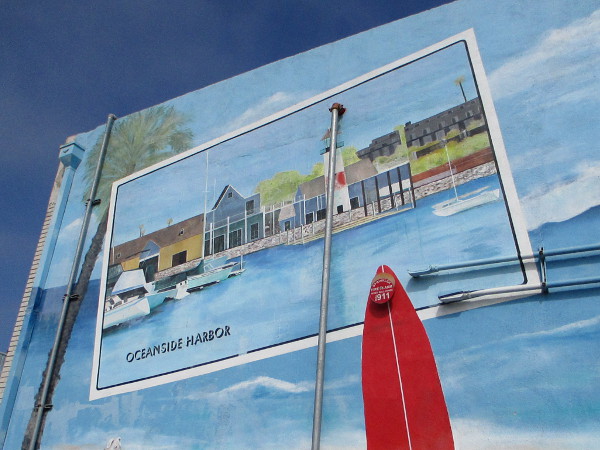 Oceanside Harbor and a surfboard.